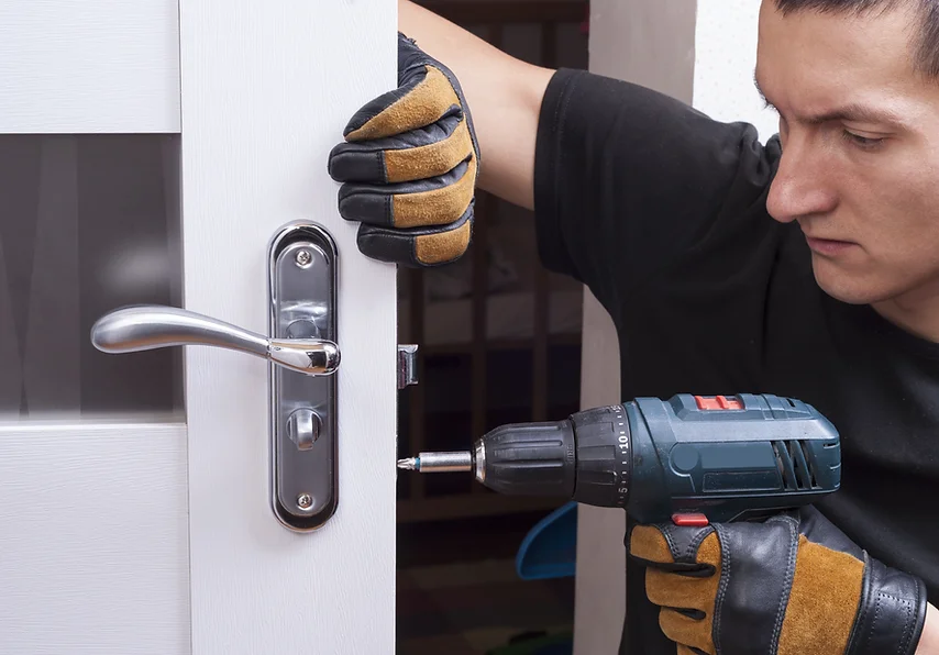 Man fixing door